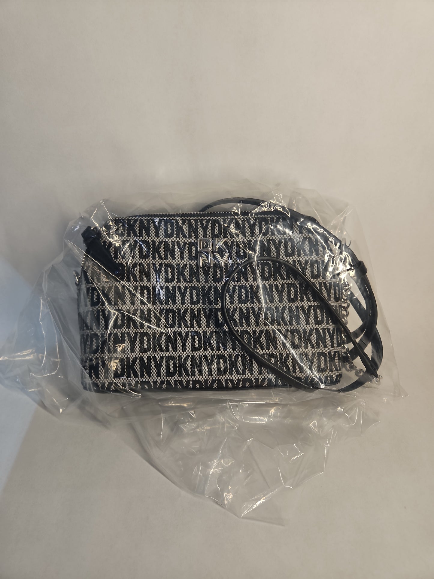 DKNY Bryant Park Dome Crossbody Bag – Black Logo Print